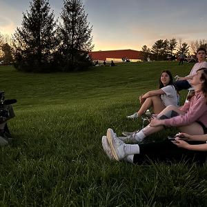 Film & New Media students watch the eclipse at a Greenacres farm